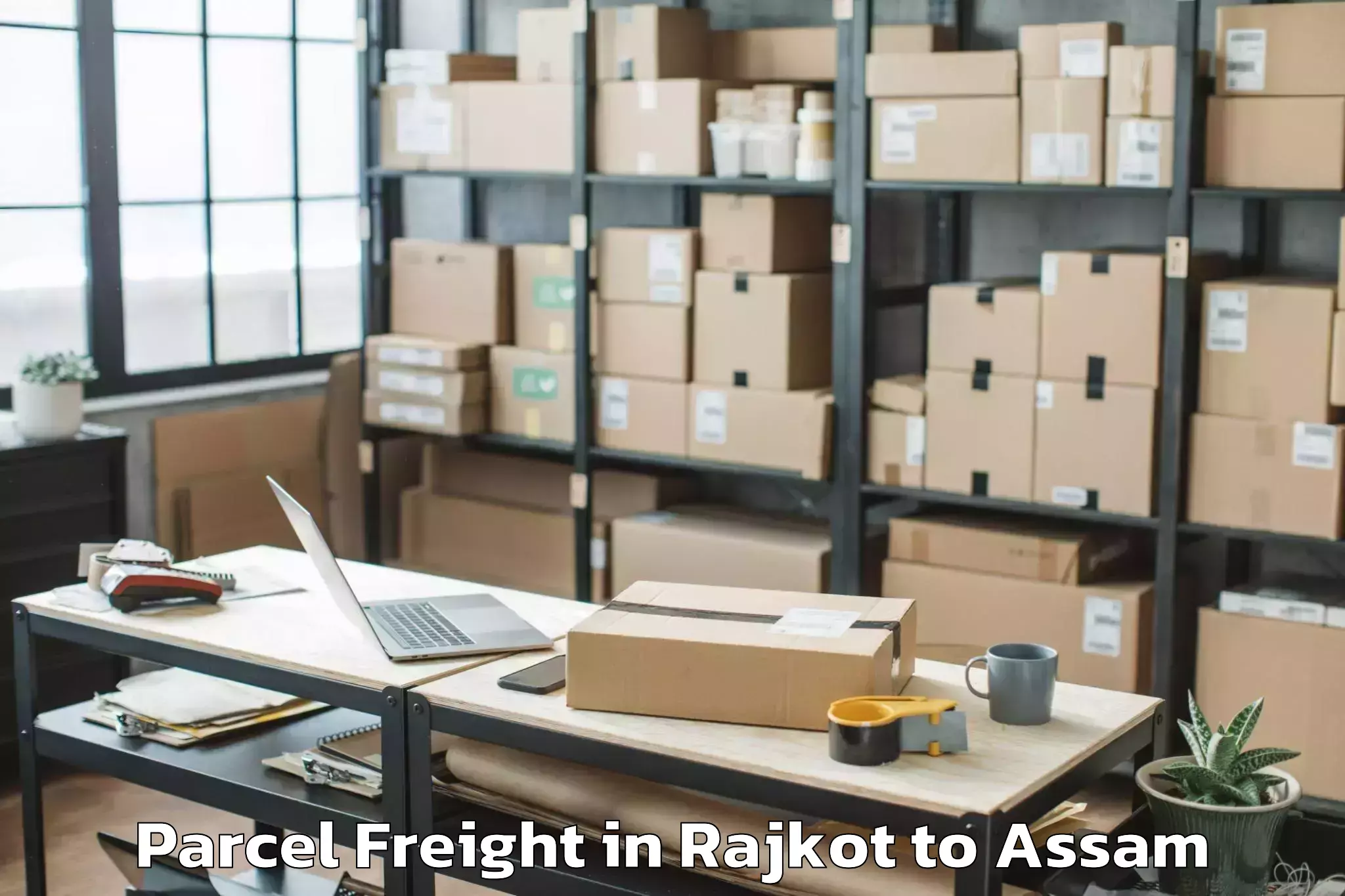 Leading Rajkot to Jorhat West Parcel Freight Provider